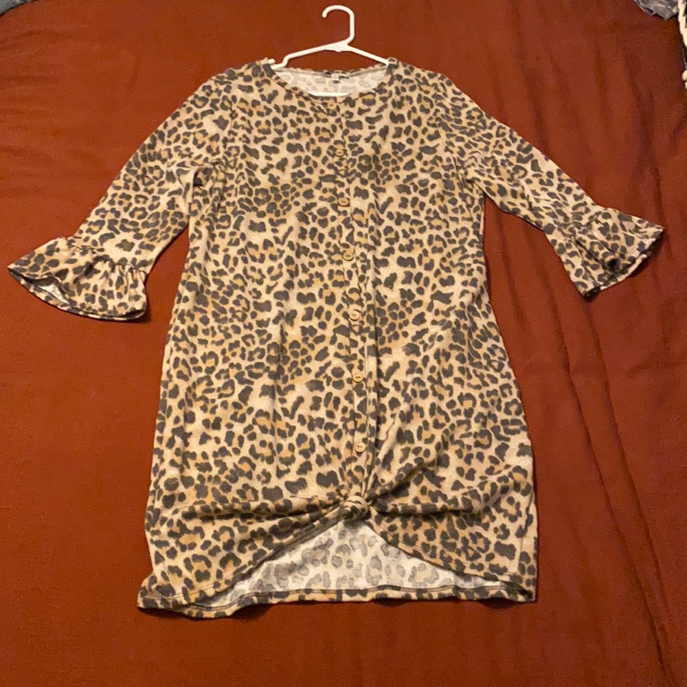 Leopard, knee length dress, 3/4 length sleeves.
